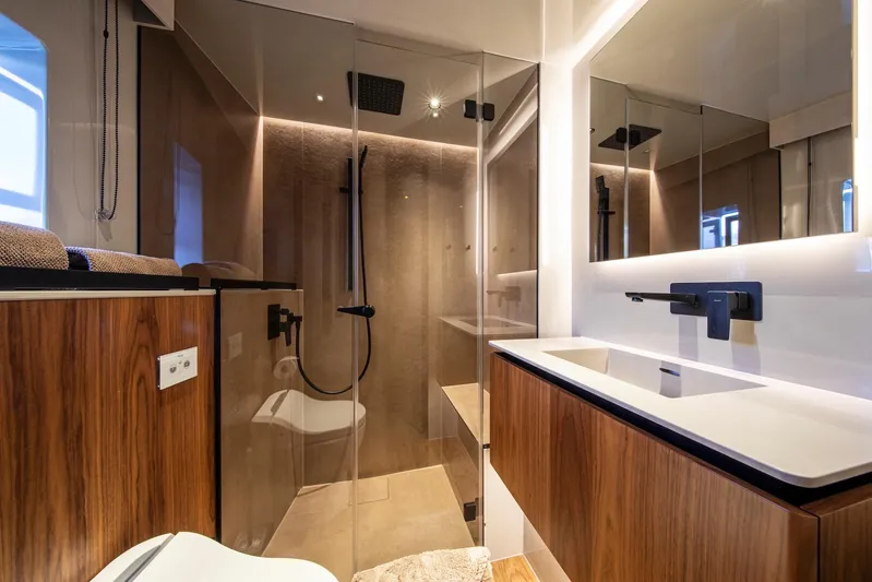 Vahewa Yacht Photos Pics Luxurious bathroom interior on 2024 Sunreef Power Cat yacht, featuring modern fixtures and elegant design.