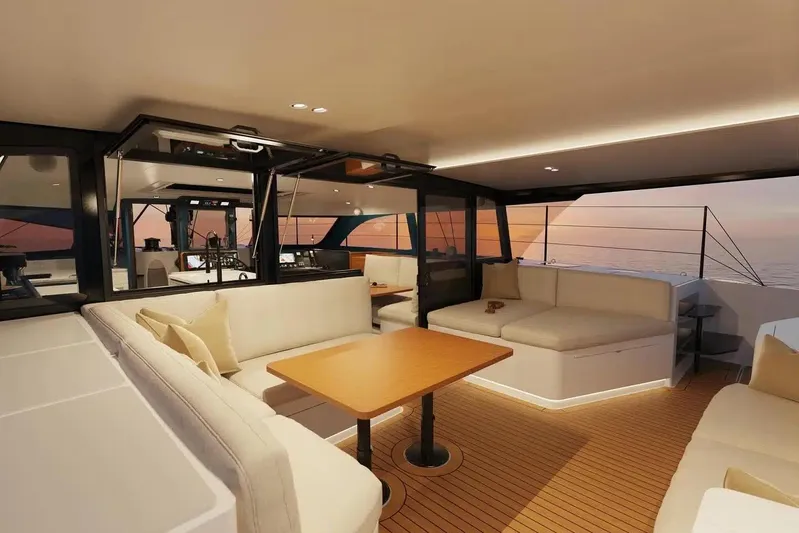 Hh56 Scf New Yacht Photos Pics Luxurious interior of 2026 HH Catamarans HH56 with sunset view, featuring elegant seating and table.
