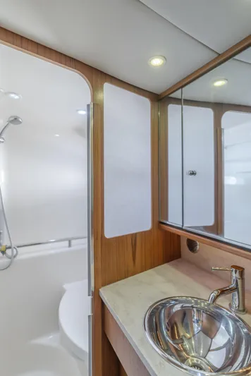 Niksen Yacht Photos Pics 2013 Tiara Yachts 3500 Sovran bathroom with modern sink and shower.