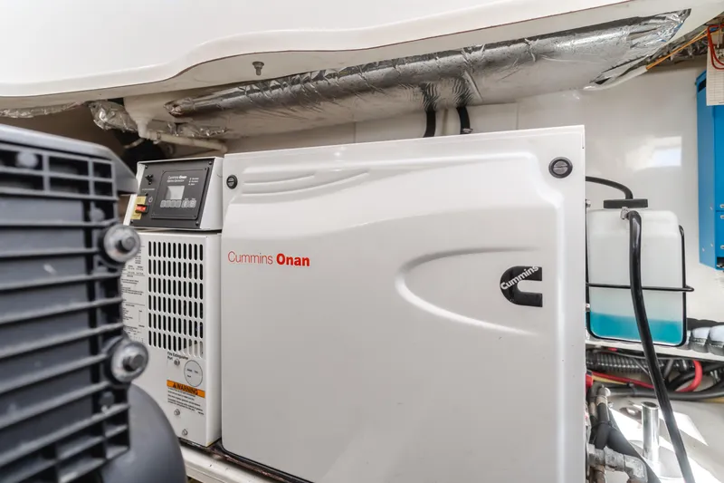 Niksen Yacht Photos Pics Cummins Onan generator in 2013 Tiara Yachts 3500 Sovran engine room.