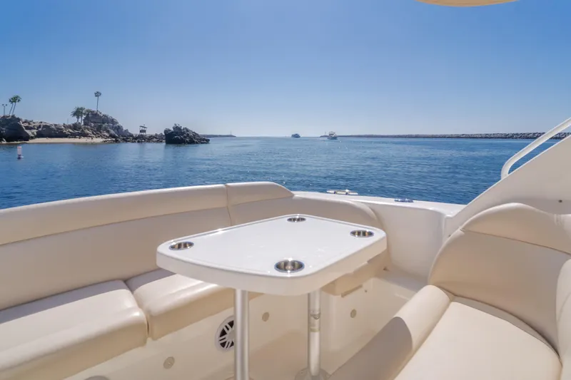 Niksen Yacht Photos Pics 2013 Tiara Yachts 3500 Sovran, luxury seating area overlooking serene ocean view.