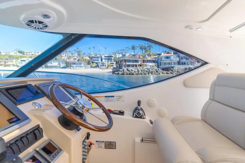 Niksen Yacht Photos Pics 2013 Tiara Yachts 3500 Sovran interior with ocean view through large windows.