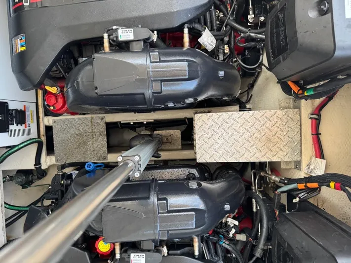 Bubbles Yacht Photos Pics Engine compartment of a 2016 Regal 35 Sport Coupe with visible components and wiring.