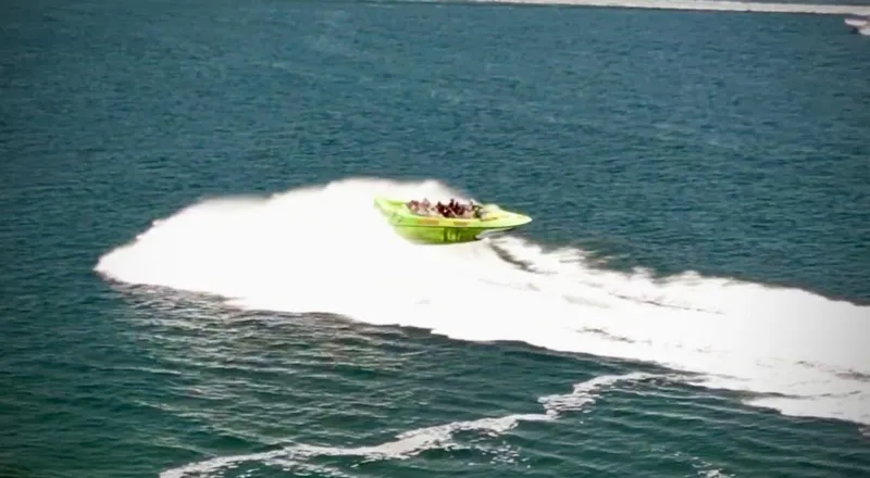 Scream Machine Yacht Photos Pics 2016 Smoky Mountain 25 Passenger Jet Boat speeding on open water.