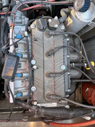 Scream Machine Yacht Photos Pics Engine of a 2016 Smoky Mountain 25 Passenger Jet Boat, showing wiring and components.