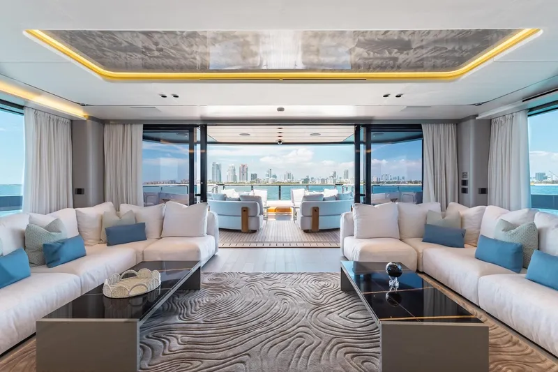 Half Irish Yacht Photos Pics Luxurious interior of 2024 Mangusta Oceano 44 yacht with city skyline view.