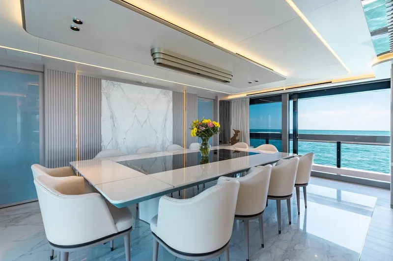 Half Irish Yacht Photos Pics Luxurious dining area on 2024 Mangusta Oceano 44 yacht with ocean view.