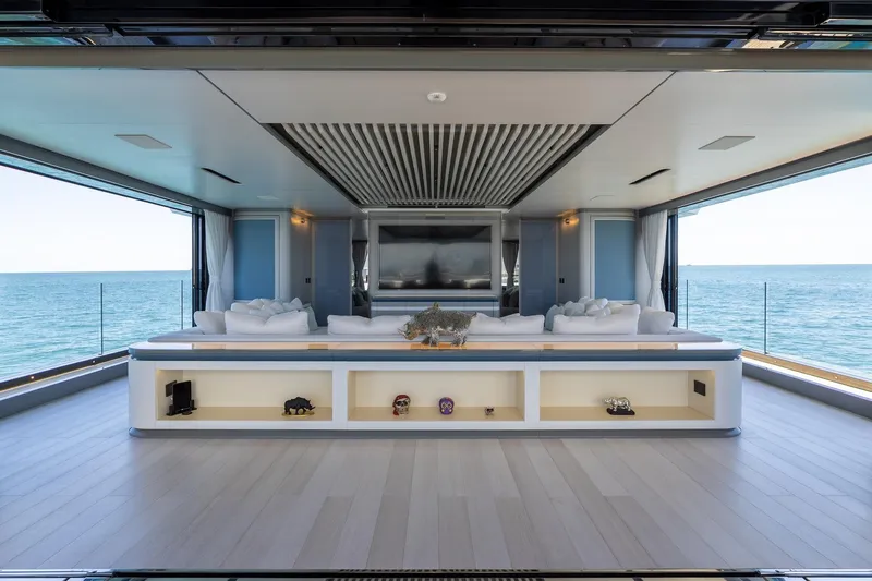 Half Irish Yacht Photos Pics Luxurious interior of 2024 Mangusta Oceano 44 yacht with ocean view and modern decor.