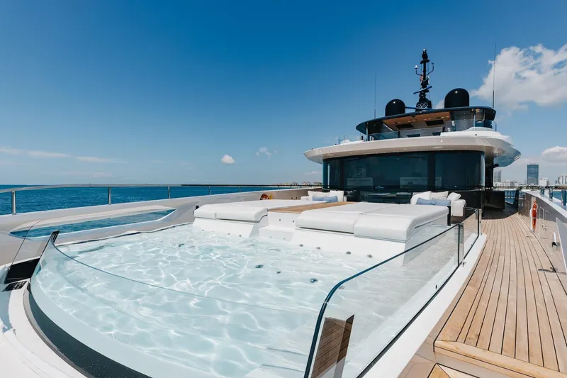 Half Irish Yacht Photos Pics Luxurious 2024 Mangusta Oceano 44 yacht with deck jacuzzi and ocean view.