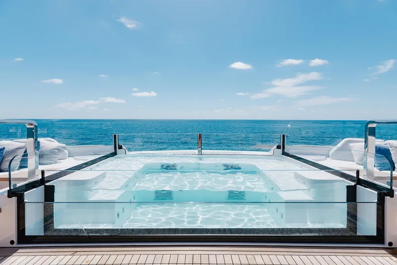 Half Irish Yacht Photos Pics Luxurious 2024 Mangusta Oceano 44 yacht with a stunning ocean-view jacuzzi.