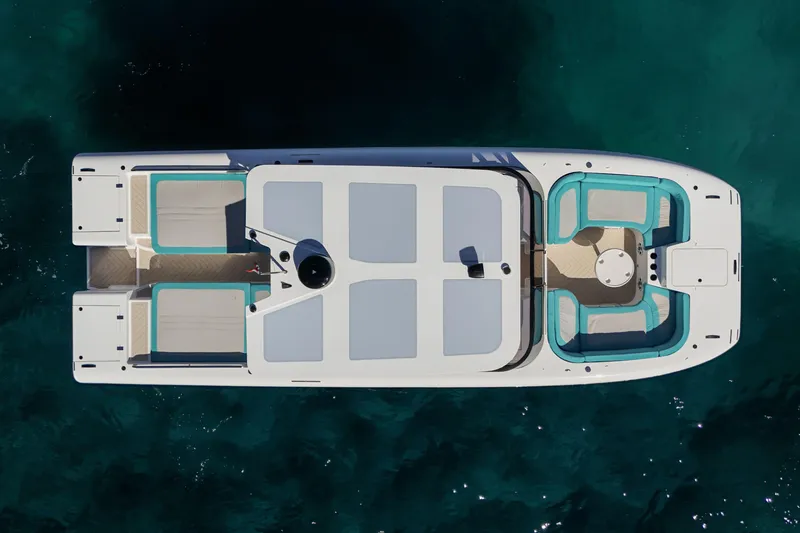  Yacht Photos Pics Aerial view of 2025 Canados Heritage 36 yacht on clear blue water.