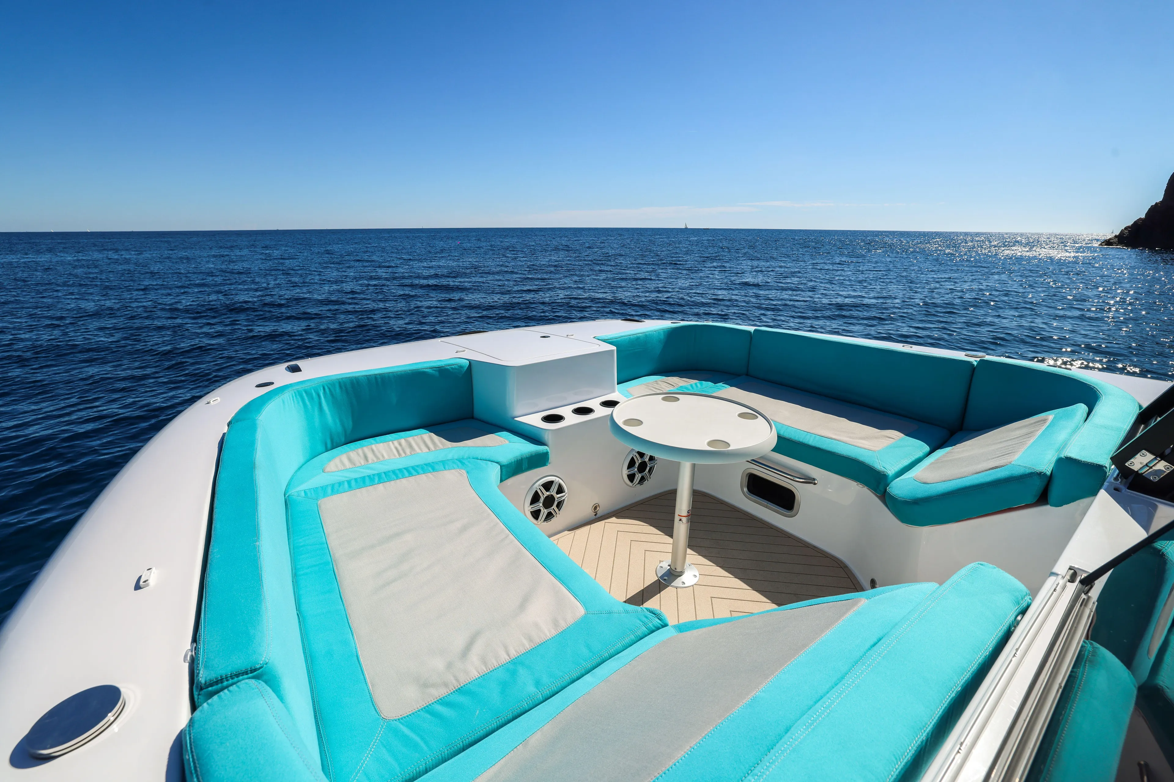  Yacht Photos Pics Luxurious Canados Heritage 36 yacht deck with turquoise seating, 2025 model, on open sea.