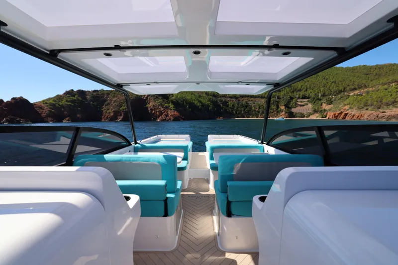  Yacht Photos Pics Interior view of 2025 Canados Heritage 36 yacht with scenic ocean backdrop.