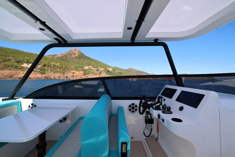  Yacht Photos Pics Interior view of 2025 Canados Heritage 36 yacht with scenic ocean backdrop.