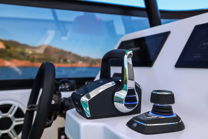  Yacht Photos Pics Control panel of 2025 Canados Heritage 36 yacht with modern steering and navigation.