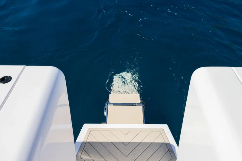  Yacht Photos Pics Canados Heritage 36 yacht swim platform, 2025 model, on clear blue water.