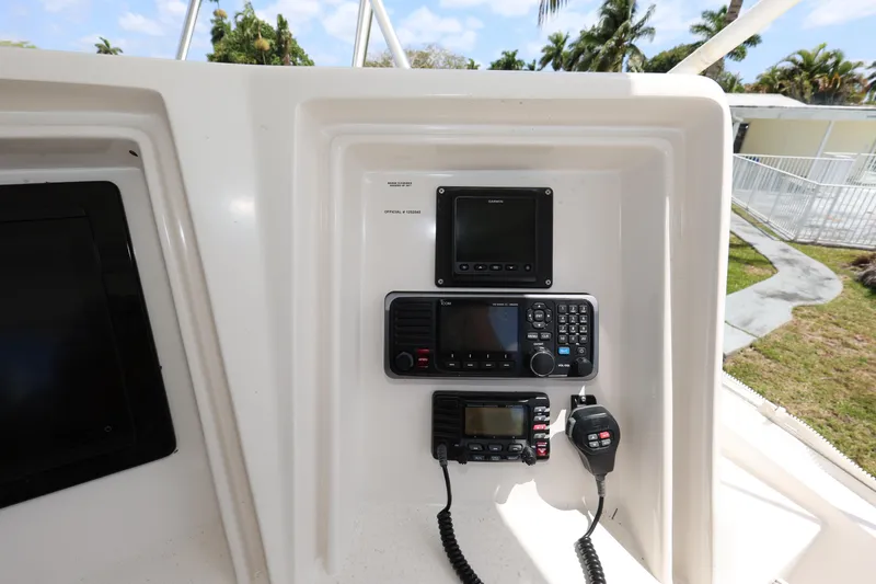  Yacht Photos Pics Control panel of a 2012 Bertram 511 boat with communication devices.