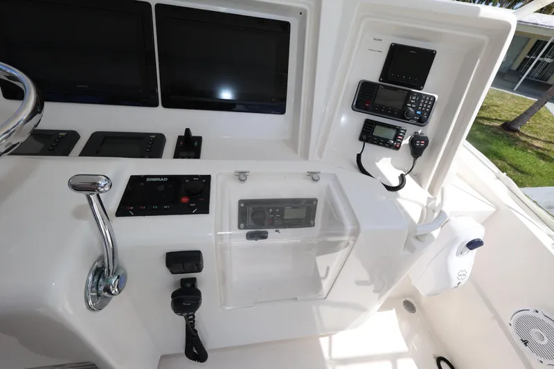  Yacht Photos Pics Control panel of a 2012 Bertram 511 yacht with navigation and communication equipment.