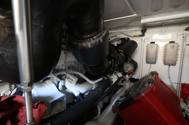  Yacht Photos Pics Engine room of a 2012 Bertram 511 yacht, featuring complex machinery and components.