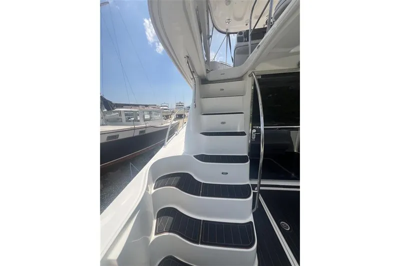  Yacht Photos Pics Staircase on 2007 Sea Ray 52 Sedan Bridge yacht, leading to upper deck.