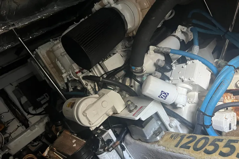  Yacht Photos Pics Engine room of 2007 Sea Ray 52 Sedan Bridge with visible components and hoses.