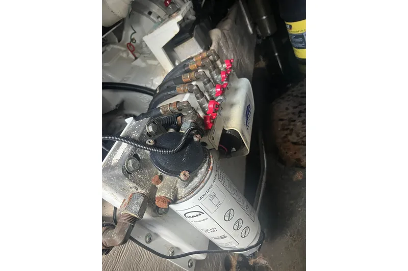  Yacht Photos Pics Engine compartment of a 2007 Sea Ray 52 Sedan Bridge with visible fuel filter.