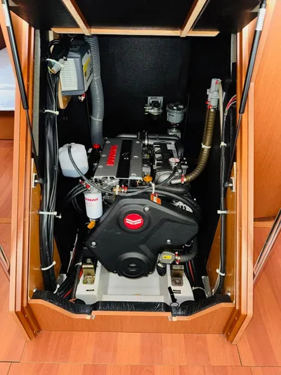 Flight Risk Yacht Photos Pics Engine compartment of a 2020 Beneteau Oceanis 51.1 sailboat, showcasing mechanical components.