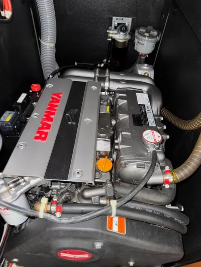 Flight Risk Yacht Photos Pics Yanmar engine in a 2020 Beneteau Oceanis 51.1 sailboat, showcasing mechanical components.