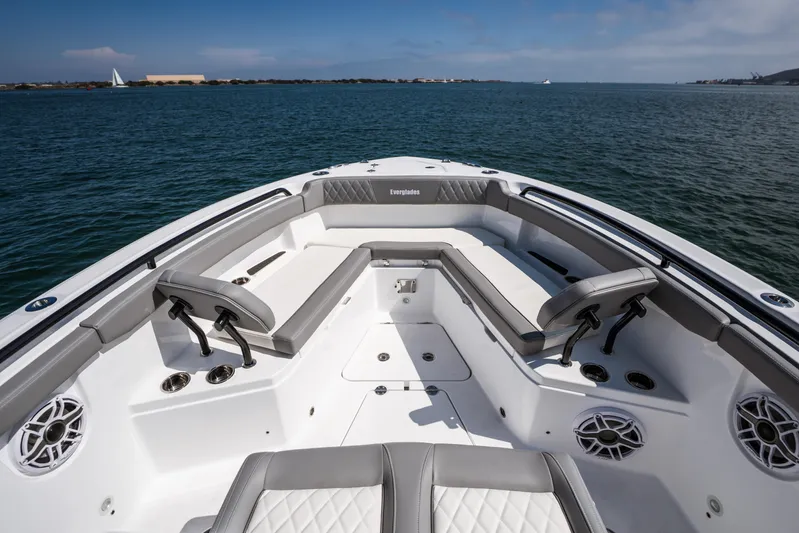 Shark Bait Yacht Photos Pics 2025 Everglades 285 Center Console boat interior with seating, on calm water.