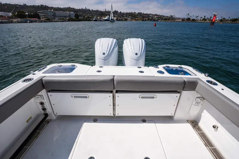 Shark Bait Yacht Photos Pics 2025 Everglades 285 Center Console boat with dual engines on calm water.