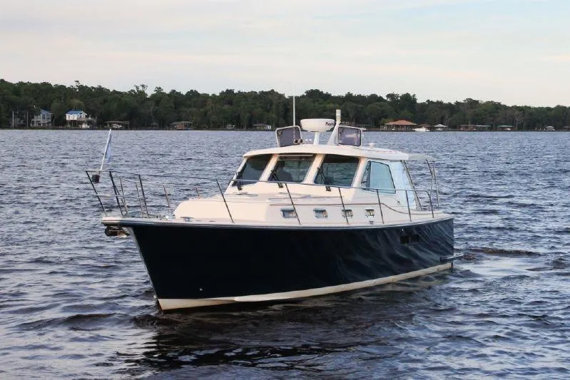 Navigator Yacht Photos Pics Island Packet Craft Express 360, 2002, on calm waters.