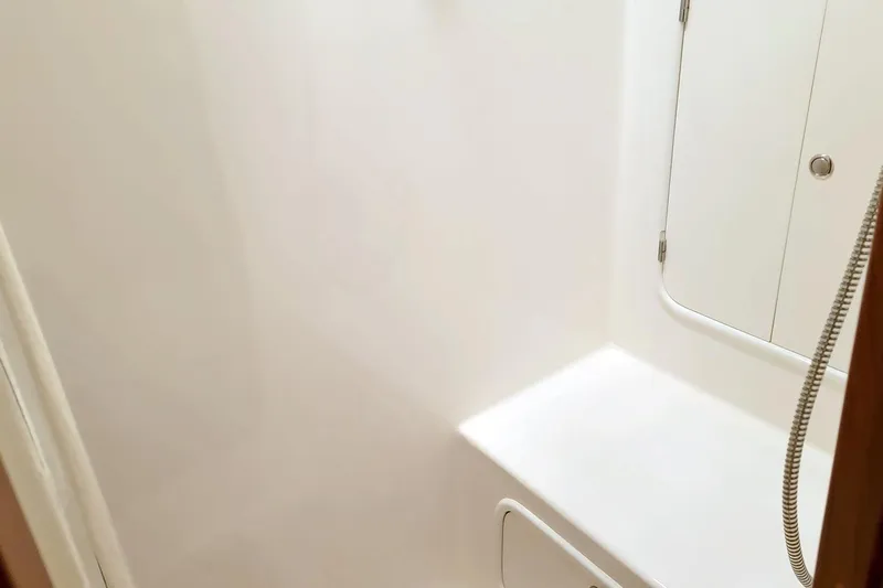 Carolina Yacht Photos Pics Interior of 2001 Nordhavn 46 yacht, featuring a clean, white shower area.