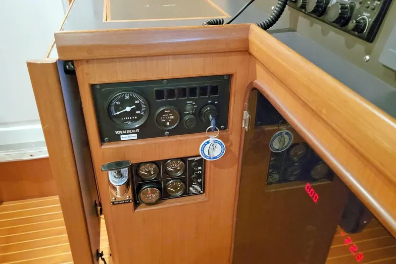 Carolina Yacht Photos Pics Control panel of a 2001 Nordhavn 46 yacht, featuring Yanmar engine gauges.