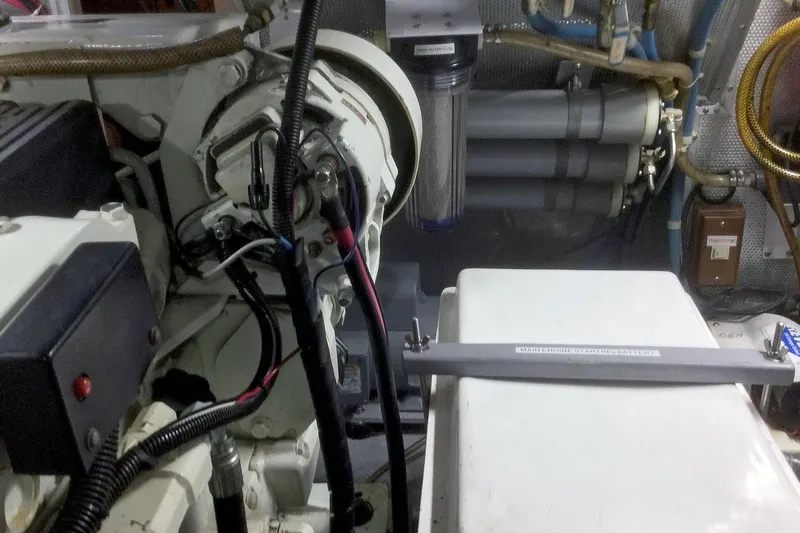 Carolina Yacht Photos Pics Engine room of 2001 Nordhavn 46 yacht, showcasing mechanical components and wiring.