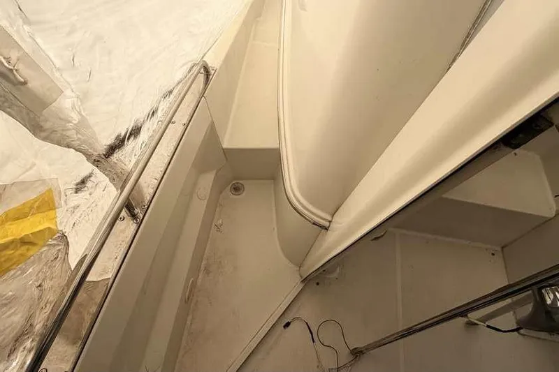  Yacht Photos Pics 2006 Carver 41 Cockpit Motor Yacht interior with white seating and railing.