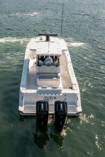  Yacht Photos Pics 2024 HCB 39 Speciale boat cruising on open water, rear view.