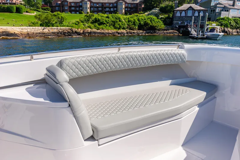  Yacht Photos Pics Luxurious seating on the 2024 HCB 39 Speciale boat with waterfront view.