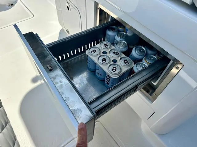  Yacht Photos Pics Built-in cooler drawer on 2024 HCB 39 Speciale boat, stocked with canned drinks.