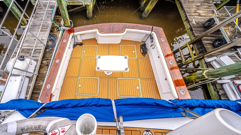 Double Down Yacht Photos Pics 1997 Ocean Yachts 60 Super Sport EB, teak deck, docked at marina.