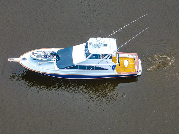 Double Down Yacht Photos Pics Aerial view of 1997 Ocean Yachts 60 Super Sport EB on calm water.