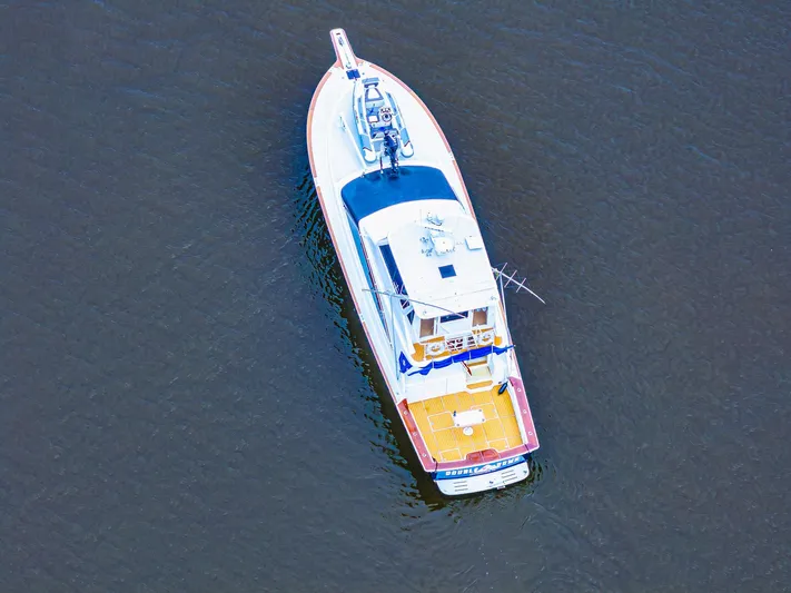 Double Down Yacht Photos Pics Aerial view of 1997 Ocean Yachts 60 Super Sport EB on calm water.