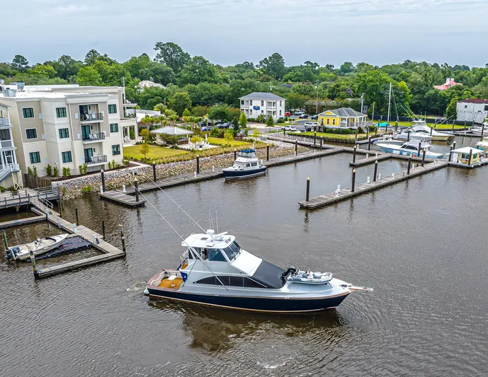 Double Down Yacht Photos Pics Aerial view of 1997 Ocean Yachts 60 Super Sport EB in a marina setting.