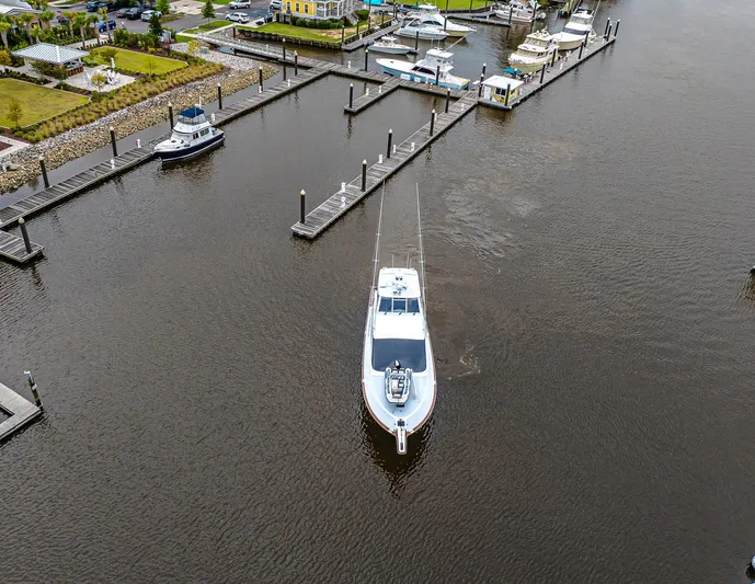 Double Down Yacht Photos Pics Aerial view of 1997 Ocean Yachts 60 Super Sport EB docked in a marina.
