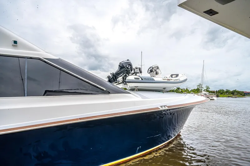Double Down Yacht Photos Pics 1997 Ocean Yachts 60 Super Sport EB docked with inflatable boat on deck.