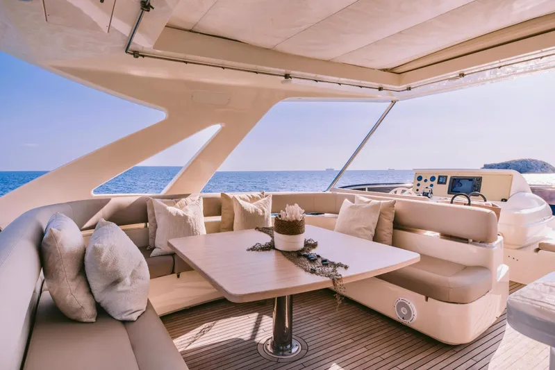 D & D Yacht Photos Pics Luxurious 2010 Ferretti Yachts 800 interior with ocean view and elegant seating area.