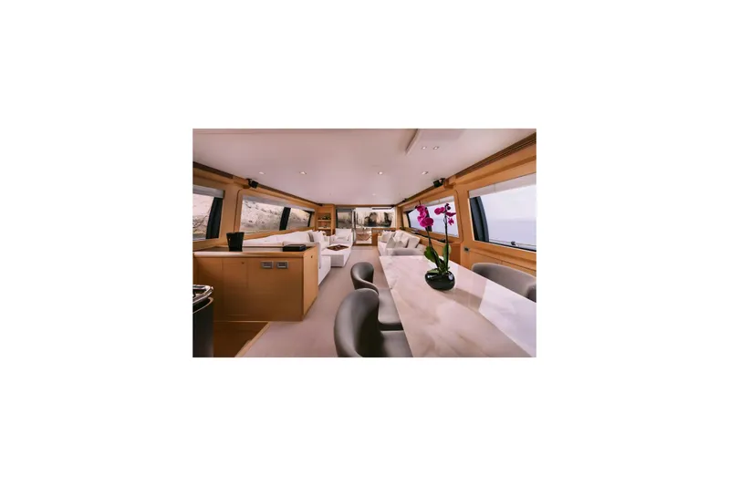 D & D Yacht Photos Pics Luxurious interior of 2010 Ferretti Yachts 800 with elegant dining area and panoramic windows.