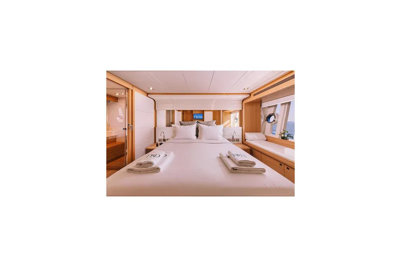 D & D Yacht Photos Pics Luxurious bedroom interior of 2010 Ferretti Yachts 800, featuring elegant design and comfort.