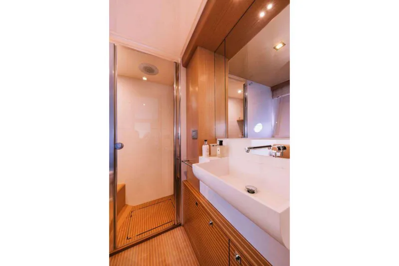 D & D Yacht Photos Pics Luxurious bathroom in 2010 Ferretti Yachts 800, featuring modern fixtures and elegant design.
