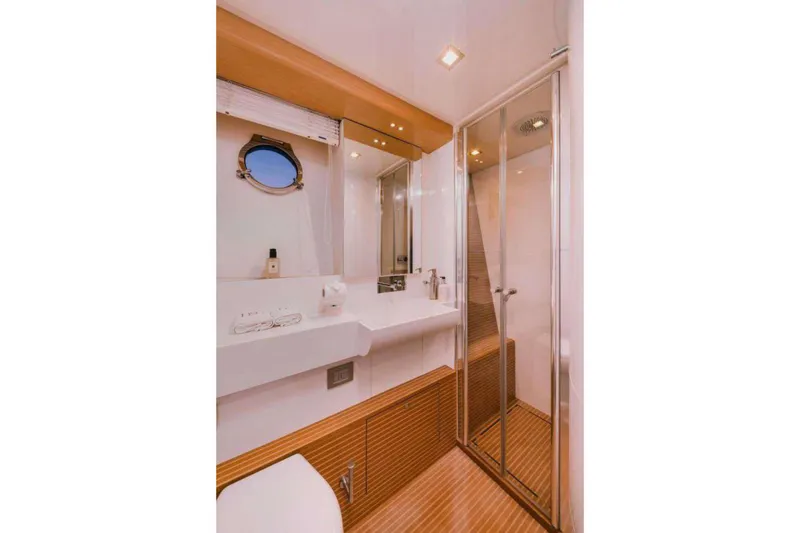 D & D Yacht Photos Pics Luxurious bathroom in 2010 Ferretti Yachts 800, featuring modern fixtures and elegant design.