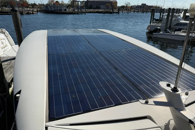 Landfall Yacht Photos Pics Solar panels on 2013 Greenline 33 boat docked at marina.